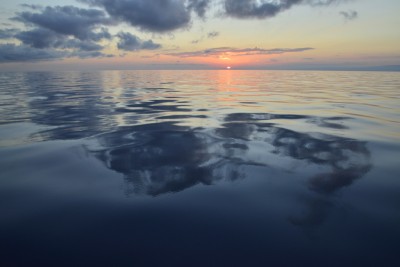 Early morning departure from Vulcano island, Italy. No wind, calm seas, and a stunning sunrise. 