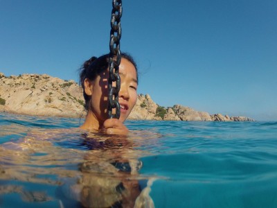 Making sure the anchor is holding at Cala Coticcio, Sardinia, Italy. 
