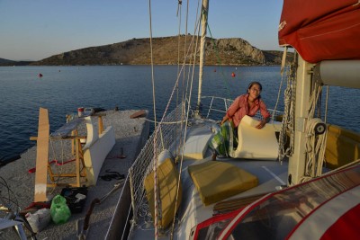 Sundy fighting the new foam into it's cover at Partheni, Leros